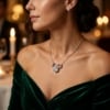 Close-up of elegant woman wearing 14K white gold Infinity Love Knot Moissanite pendant necklace on collarbone